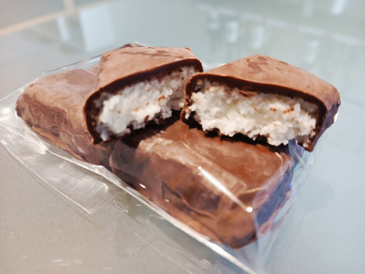 Carré au chocolat noir fourré à la crème de noix de coconut (4 x 14g)